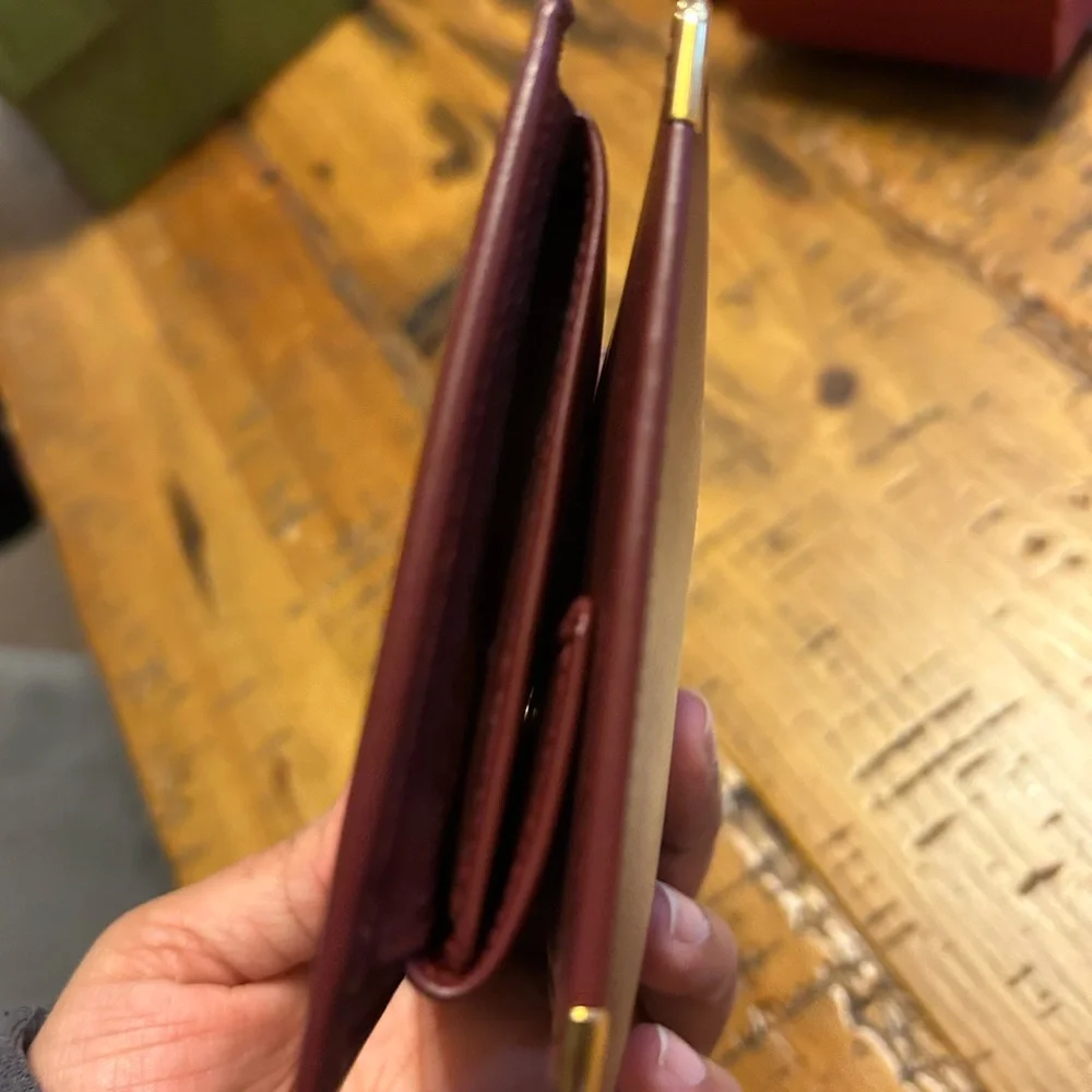 Cartier Deep Burgundy Leather bifold Gold Corner Hardware